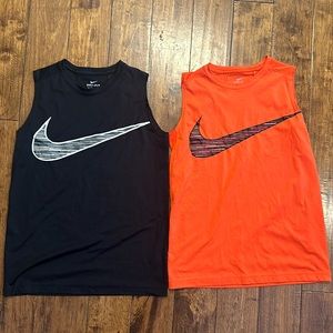 2 Nike sleeveless shirts. Youth large